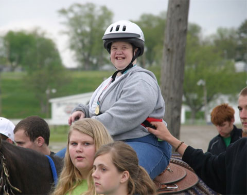 Special Riders provides individuals with severe physical disabilities the opportunity to ride horses. Volunteers and staff work in teams of three to facilitate a safe horseback riding experience for participants.